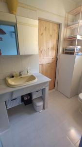 a bathroom with a sink and a toilet at Reka Casa in Mojácar +10 photos