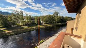 a view of a river from a balcony at Apartmány Pod Stráží in Sušice +41 photos