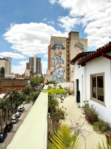 a building with a large mural on the side of it at Asuncion Palace in Asunción