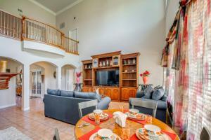 a living room with a table and chairs at Red Oak Group Getaway w/ Yard + Patio in Red Oak
