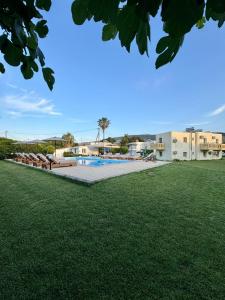 a view of the pool at a resort at Angelos Studios in Kos