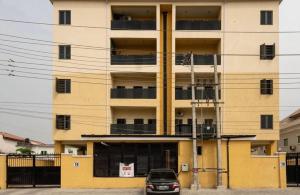 a car parked in front of a building at The Zenith Palace in Lekki