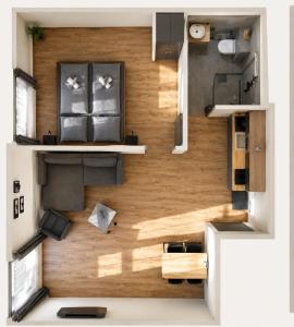 a floor plan of a small apartment with a kitchen at Apartmány Pod Stráží in Sušice
