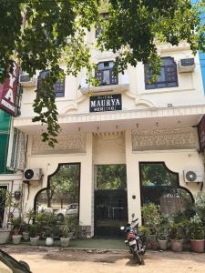 a motorcycle parked in front of a building at Hotel Maurya Heritage In Karol Bagh in New Delhi