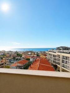 a view of the city from the balcony of a building at B&B Catanzaro lido La collina dei poeti in Catanzaro Lido