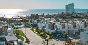 an aerial view of a city and the ocean at Baja Ocean View 3 BR Panoramic Terrace & Private Jacuzzi 8pp in Rosarito