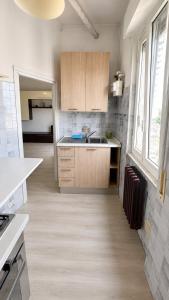 a kitchen with a sink and a counter top at Alessandro home in Rozzano