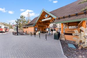 a building on a street with a train station at Flying Dutchman #1158 in Keystone