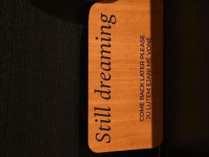 a wooden bat with at Mercure Prishtina City in Prishtinë