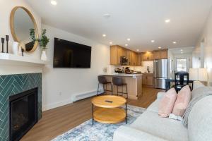a living room with a couch and a fireplace at Tenmile Creek #215 : 2 in Frisco