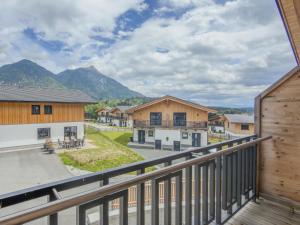 a balcony with a view of the mountains at Obermöschach 1A in Lake Pressegg
