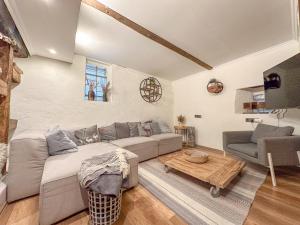 a living room with a couch and a coffee table at Briedel in Briedel