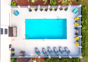 an overhead view of a swimming pool in a building at The Windstar Hotel - Emerald Isle, Swansboro in Cedar Point