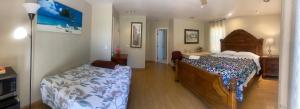 a bedroom with a bed and a sink in it at WM Private master suite with separate entry in San Jose