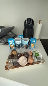 a tray of food on a table with food at La Terraza del Àtico con parking incluido in Vigo +23 photos