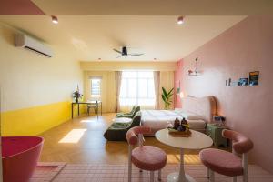 a living room with a couch and a table at Lot 78 in Malacca