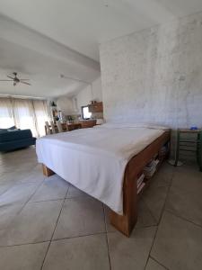 a bedroom with a large bed in a room at Adriatic Lifestyle Apartment in Stari Grad