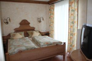 Postel nebo postele na pokoji v ubytování Jagdhotel Sudetenhof
