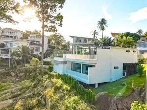 an aerial view of a house with blue at Luxury Villa Infinity Pool Panoramic Seaview Villa Ananda in Ban Thung