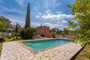 a swimming pool in front of a house at Modern Holiday Home Pool & Wifi in Roquebrune-sur-Argens