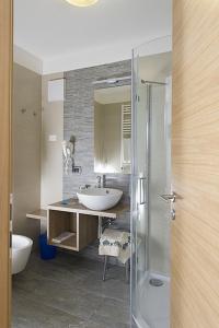 Koupelna v ubytování Hotel Aida