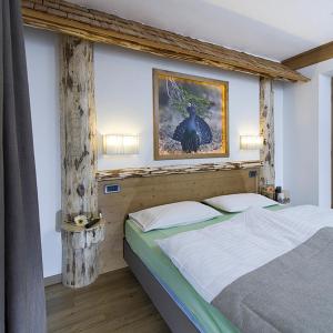 Postel nebo postele na pokoji v ubytování Hotel Aida