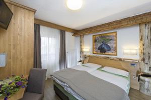 Postel nebo postele na pokoji v ubytování Hotel Aida