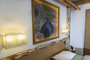 Postel nebo postele na pokoji v ubytování Hotel Aida