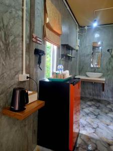 a kitchen with a sink and a counter top at NO name bangalow in Ko Lanta Yai +122 photos