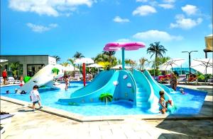an image of a water park with a slide at Azure in Mamaia Sat/Năvodari