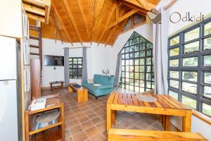 a living room with a couch and a table at Od Kidi Cottages in Migori