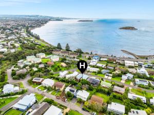 an aerial view of a suburb with a street sign at Encounter Bay Family Escape, Sea Views, Games Room & Walk to The Bluff in Encounter Bay