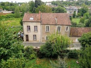 an old house in the middle of a village at 2-room apartment in Clamecy