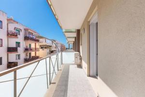 an apartment balcony with a view of a street at B&B Acquamarina in Gallipoli