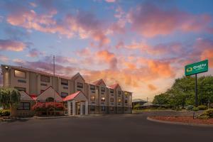 a rendering of a hotel with a cloudy sky at Quality Inn Knoxville West Cedar Bluff in Knoxville