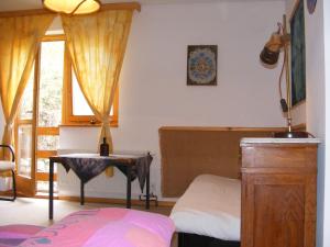 Postel nebo postele na pokoji v ubytování Mackólak Vendégház és Ökoporta