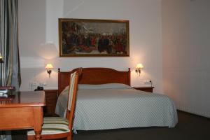 Postel nebo postele na pokoji v ubytování Art Hotel Academy