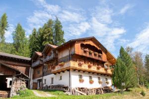 a building with balconies on the side of it at Binterhof in Sesto
