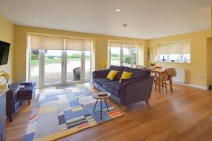 a living room with a couch and a table at 1 Bed in Corsham oc-83690 in Box
