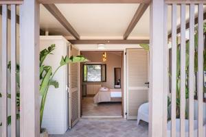 a guest house with a guest bedroom in the background at La Ginestra in Fiore Camere in Sirolo