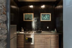 Kuchyň nebo kuchyňský kout v ubytování Loft Garibaldi + 25 fotografií