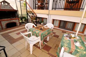 Posezení v ubytování Rodon Apartments - S Avdimioti + 28 fotografií