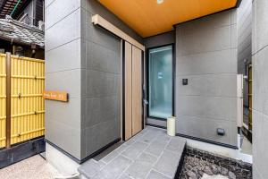 an outside view of a building with a door at ドリームホテル住吉 in Sumiyoshi +24 photos