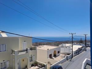 a view from the balcony of a building at Villa Firostefani in Firostefani