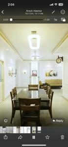 a picture of a dining room with a table and chairs at JDs elite in Trivandrum