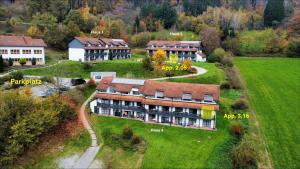 an aerial view of a large house in a field at Auszeit am Fluss - Donau in Obernzell