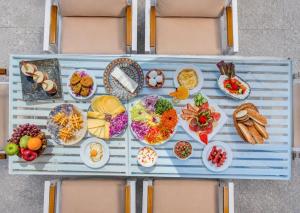 a table filled with different types of food at The Stay Pyramids Inn in Cairo