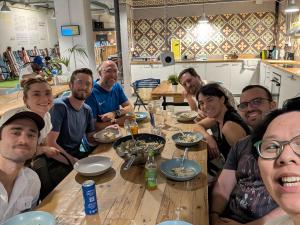 a group of people sitting around a table at Bed & Bike Barcelona in Barcelona