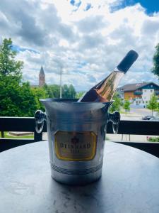 a container with a knife in it on a table at Gemütliches Doppelzimmer mit Balkon und Saunaoption Nordschwarzwald in Simmersfeld +15 photos