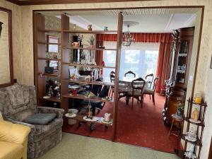 a living room with a couch and a table at Villa Margot in Schrems